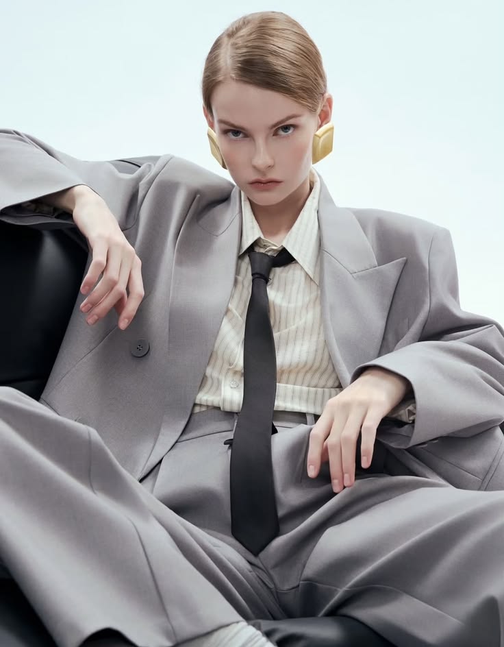 women wearing blazer and tie